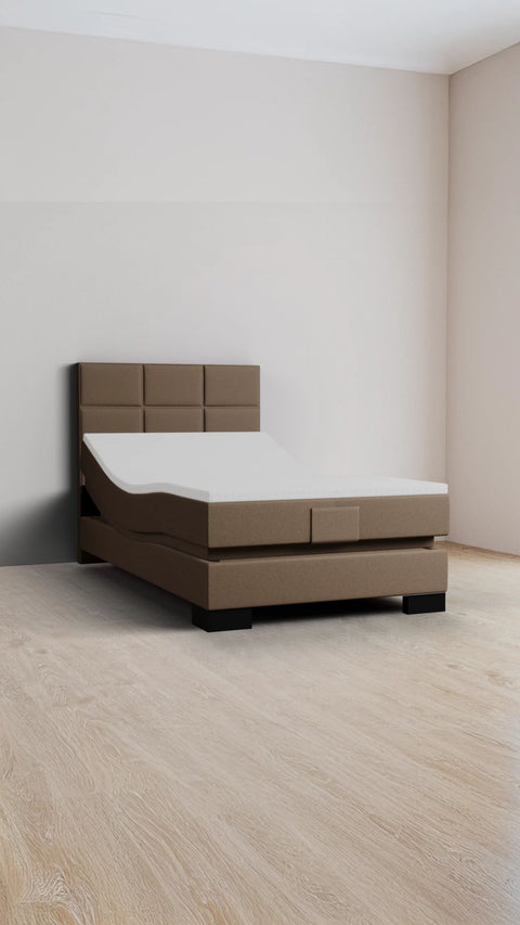 Bruin eenpersoons boxspringbed 140x210 cm
