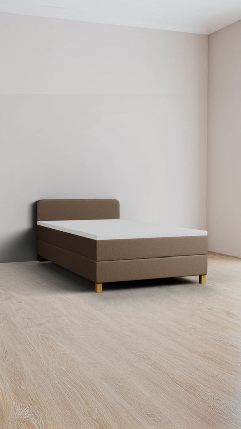 Bruin eenpersoons boxspringbed 90x200 cm