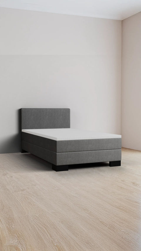 Grey single boxspring bed 140x200 cm